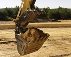 Picking up dirt with Ditch Cleaning Bucket